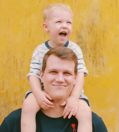 Dad carrying son on his shoulders
